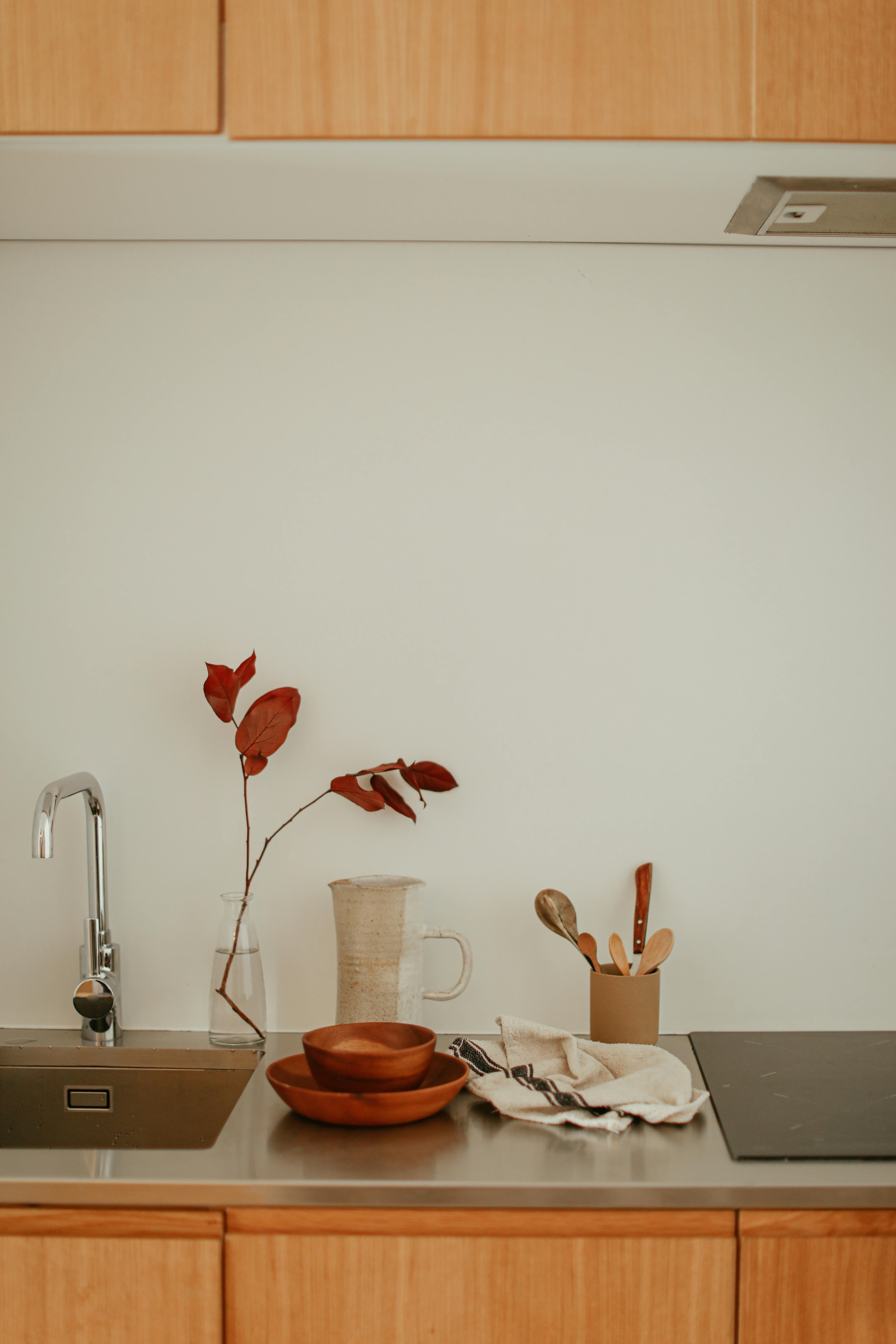 A calm, organized kitchen with warm wood tones